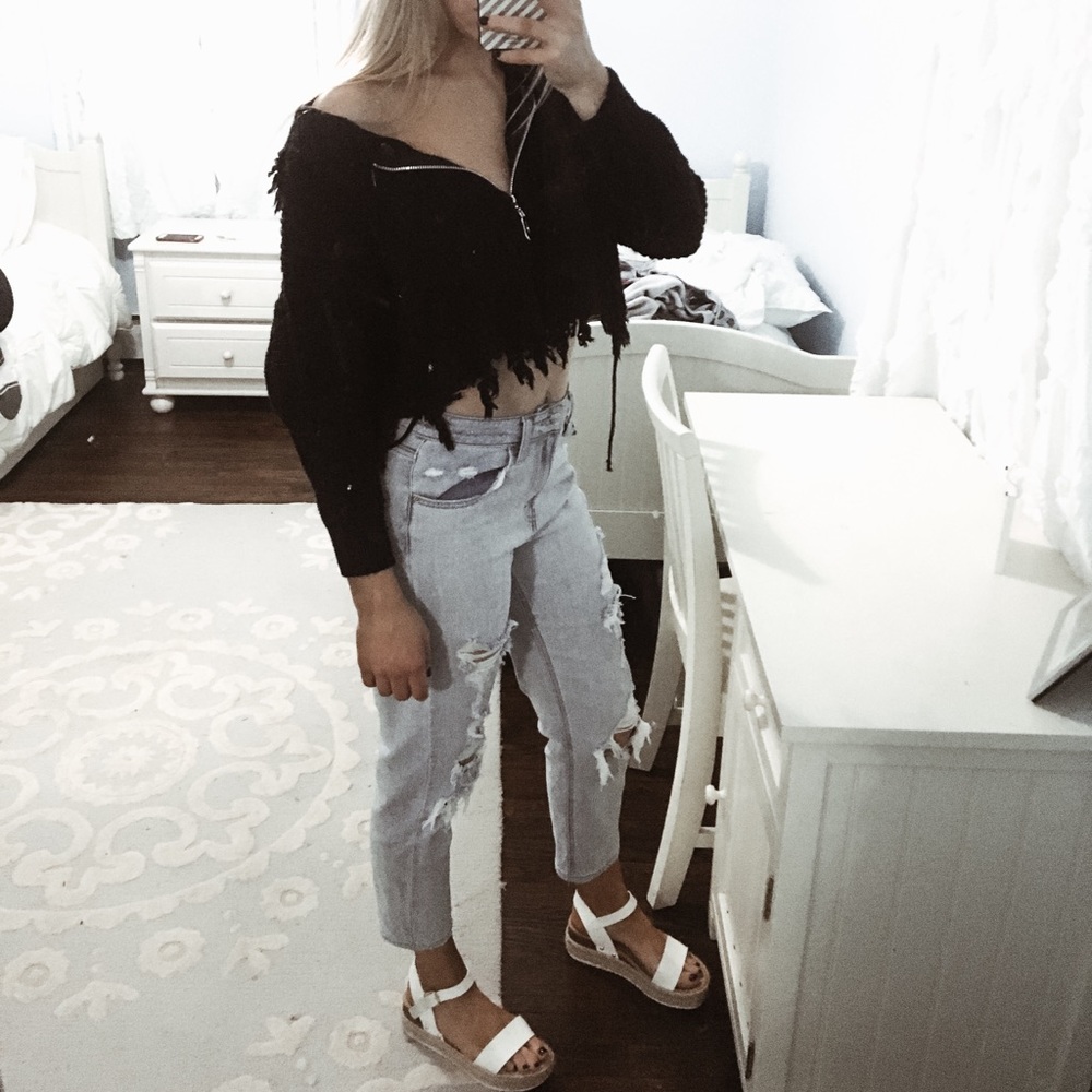 black distressed zippered long sleeved